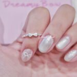 Bow diamond ring