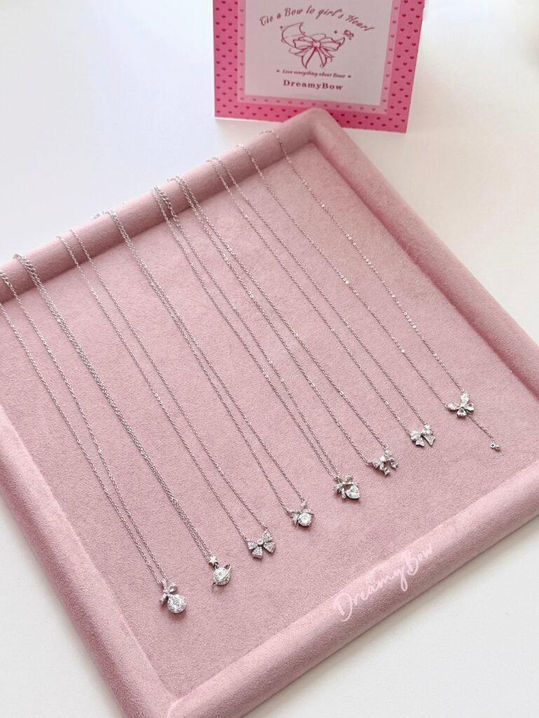 bow jewelry flat lay